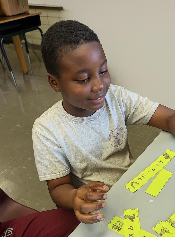 Confident student giving testimonial about how Y-Math tutoring improved math skills and confidence